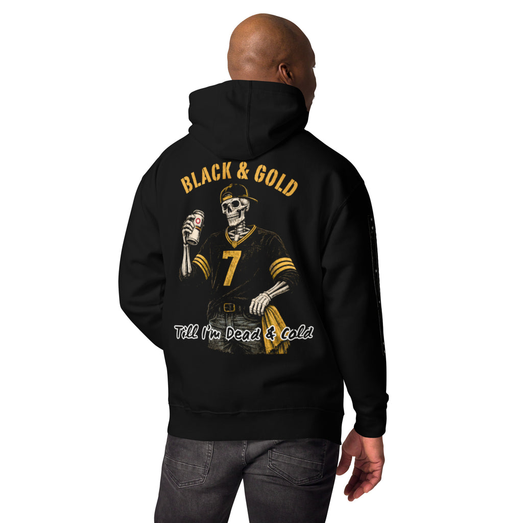 Man wearing a hoodie. Black & Gold Till I'm Dead & Cold printed on a Black Hoodie with a Skeleton wearing a hat, number 7 Pittsburgh Football Jersey, jeans, with a gold towel in his pocket, and a beer in his hand.