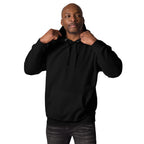 Man wearing a black hoodie shown from the front, with his hands on the hood.