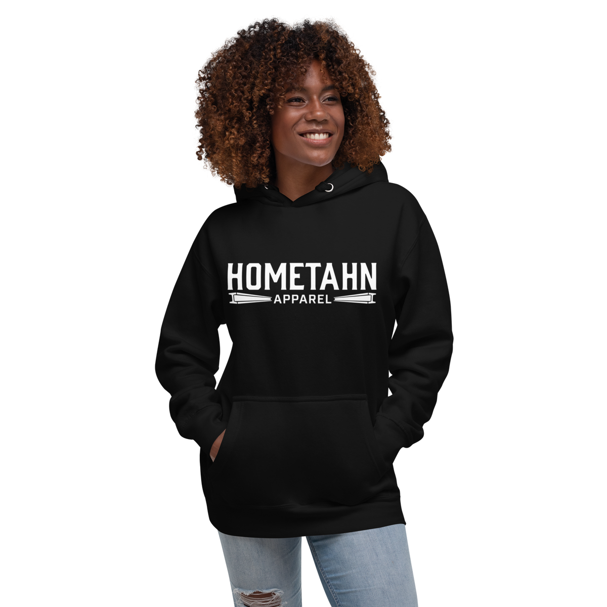 Woman wearing a black hoodie with "HOMETAHN APPAREL" logo on front.
