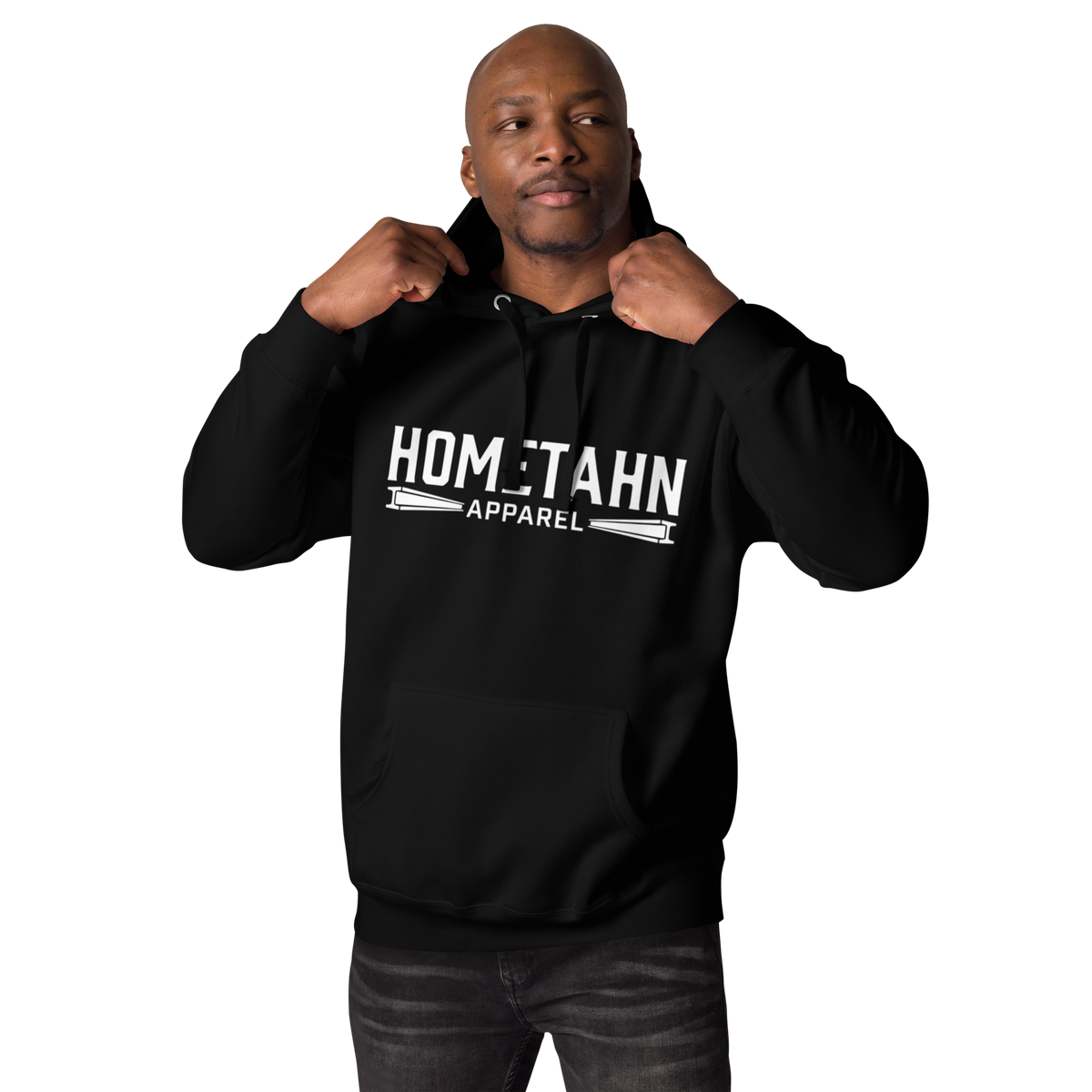 Man wearing a black hoodie with "HOMETAHN APPAREL" logo on front.