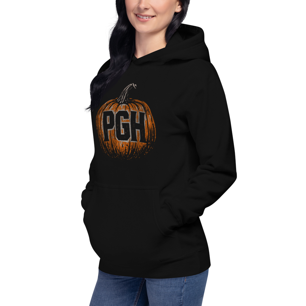 Woman wearing PGH Pumpkin Design on Black hoodie