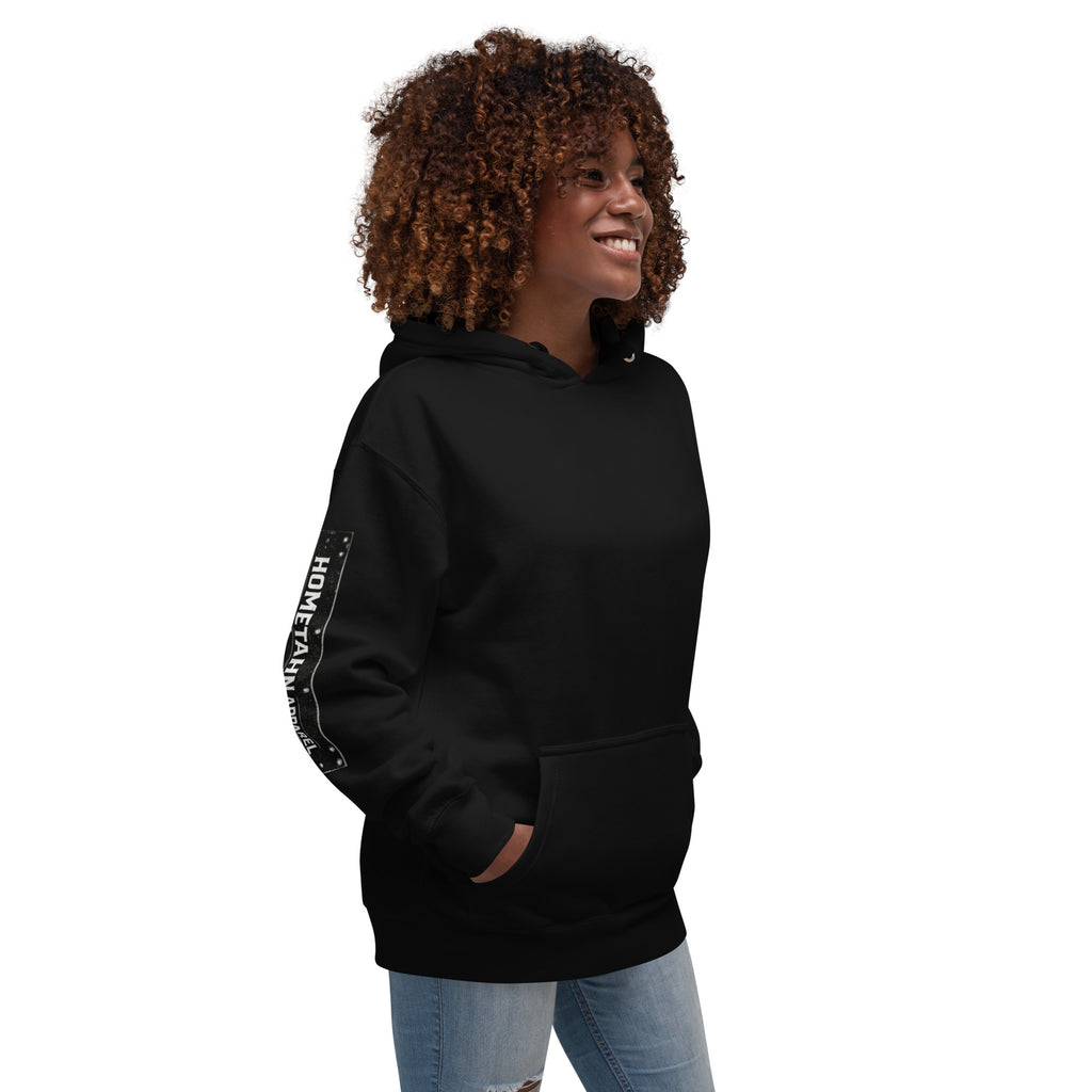 Woman wearing a black hoodie shown from an angel.