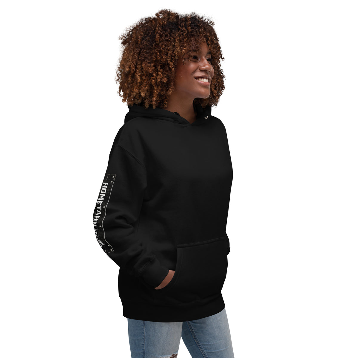 Woman wearing a black hoodie shown from an angel.