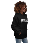 Woman wearing a black hoodie with "HOMETAHN APPAREL" logo on front.