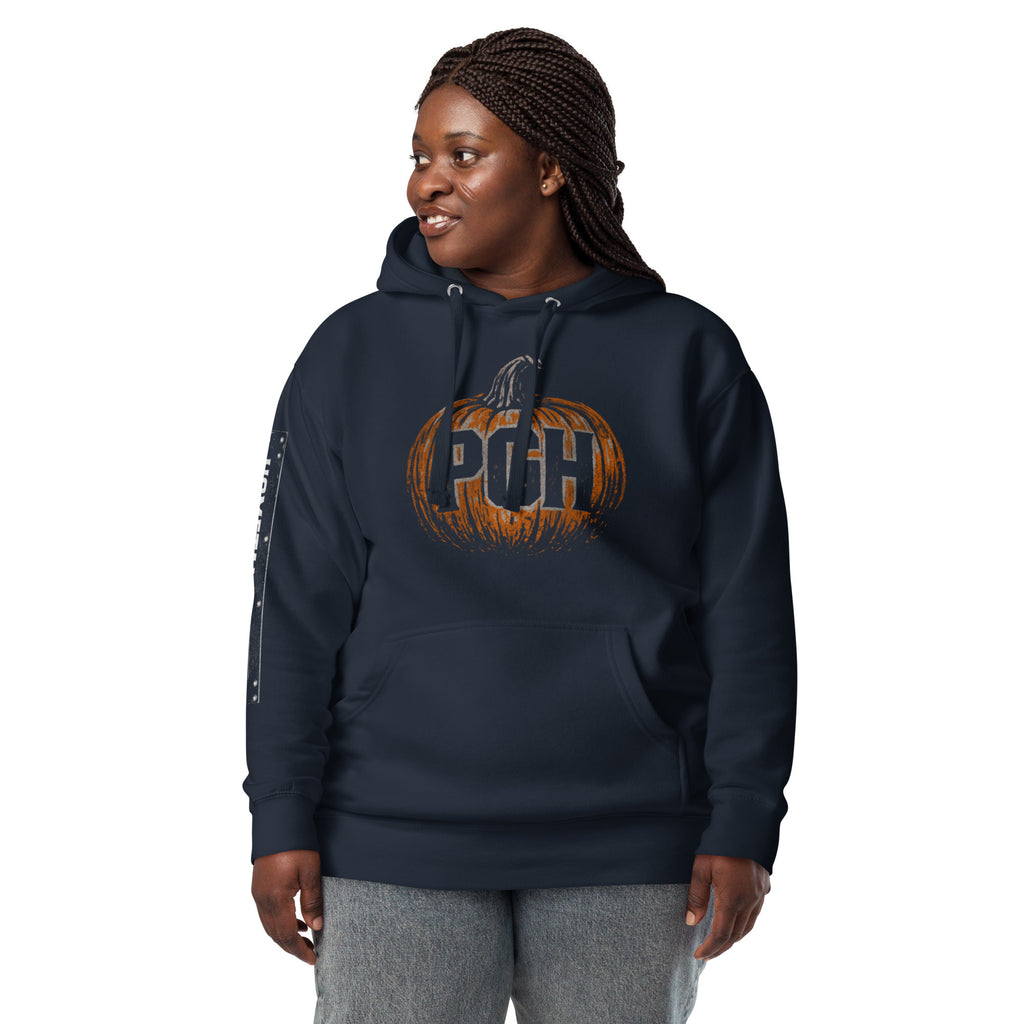 Woman wearing PGH Pumpkin Design on blue hoodie