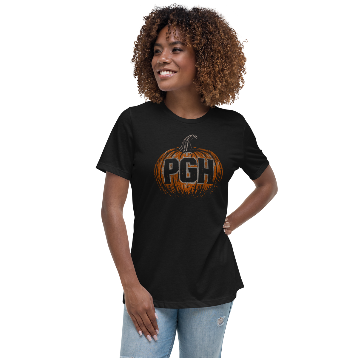 A woman wearing a short sleeve black t-shirt with an orange pumpkin engraved with "PGH".