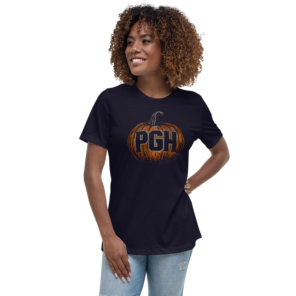 Woman wearing a NAVY BLUE t-shirt with an orange pumpkin and the letters "PGH" carved into it.